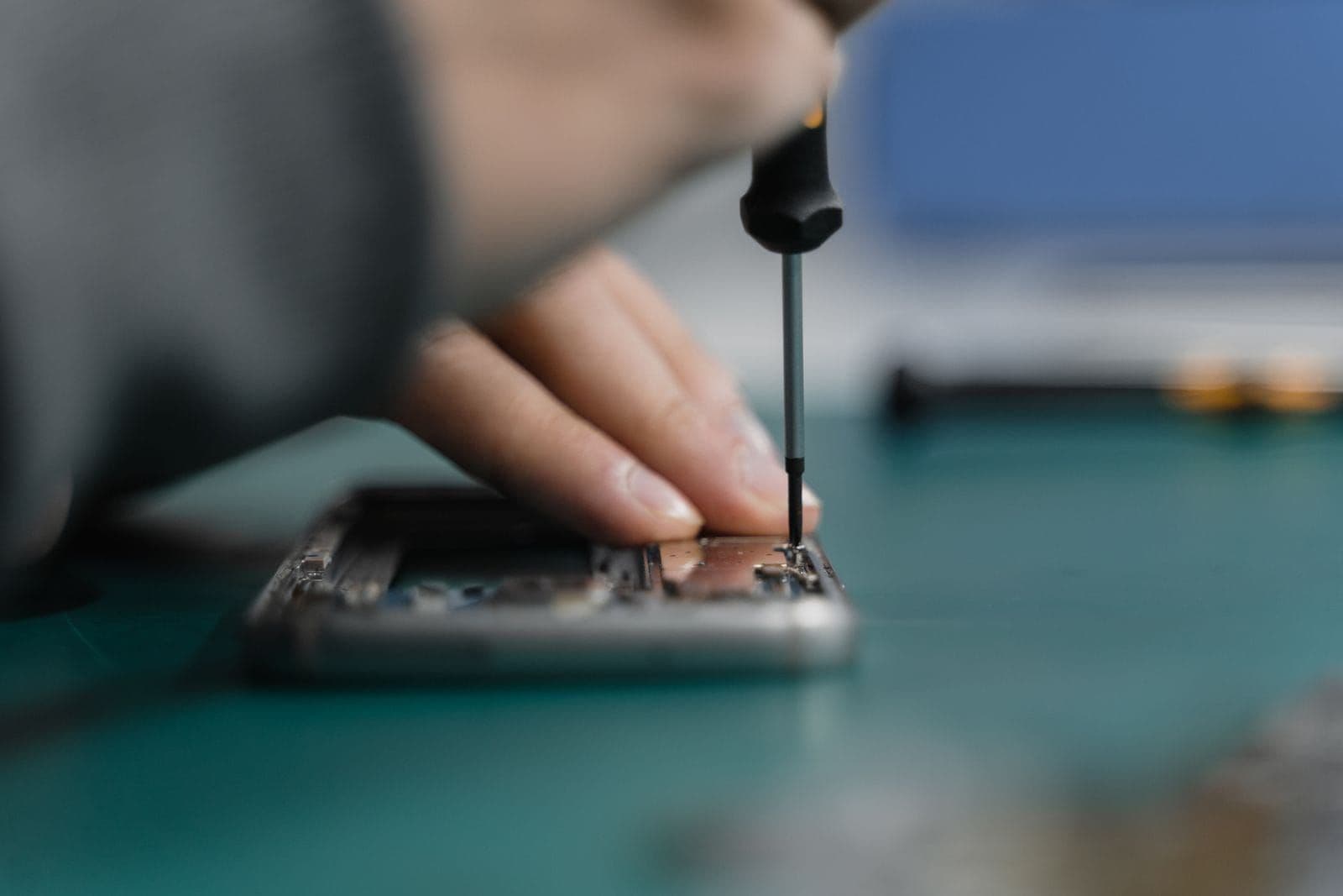 Technician repairing an electronic device