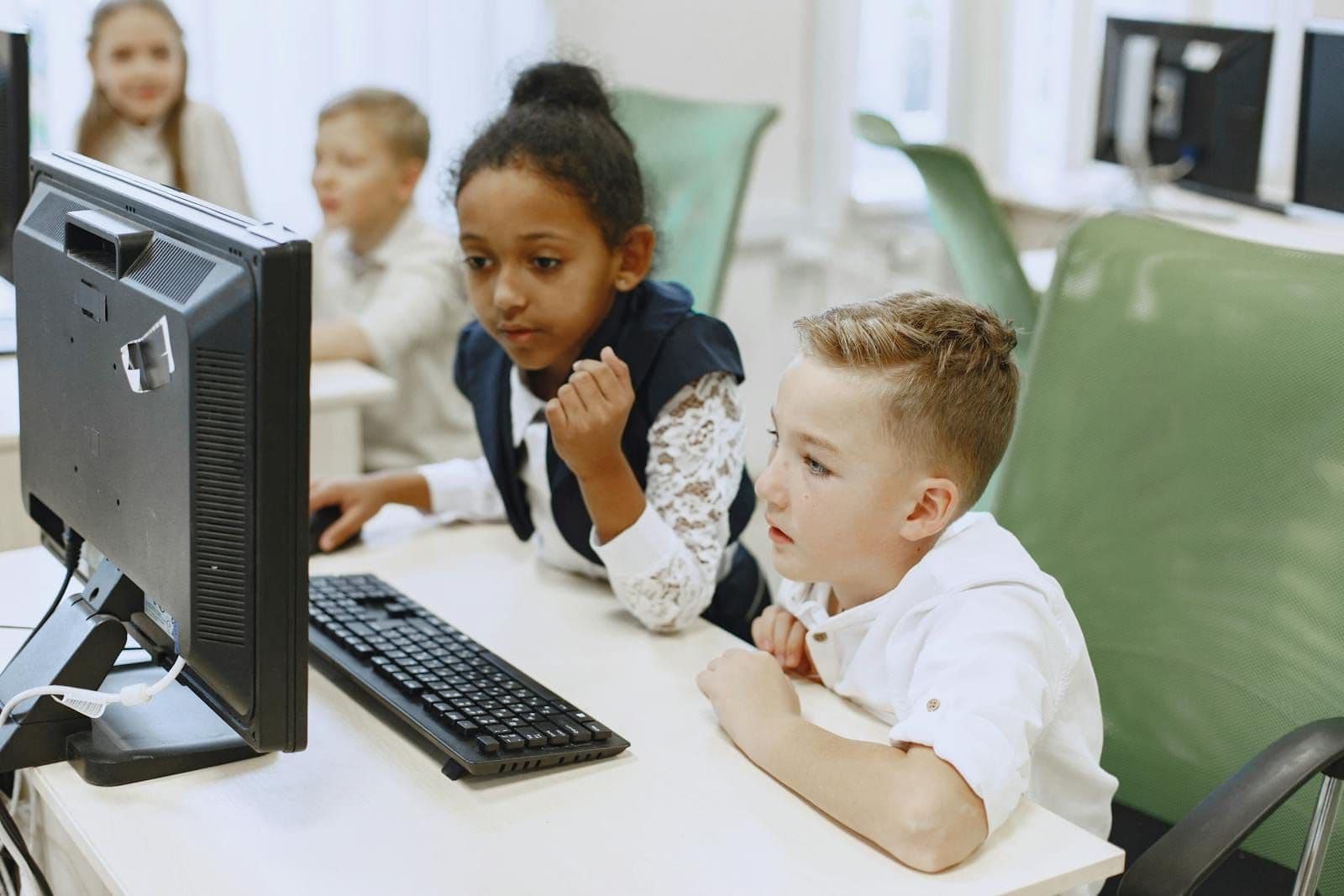 Child learning on a computer
