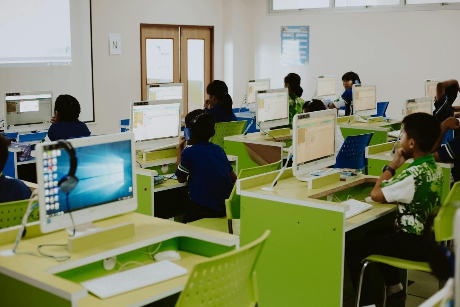 Children coding together